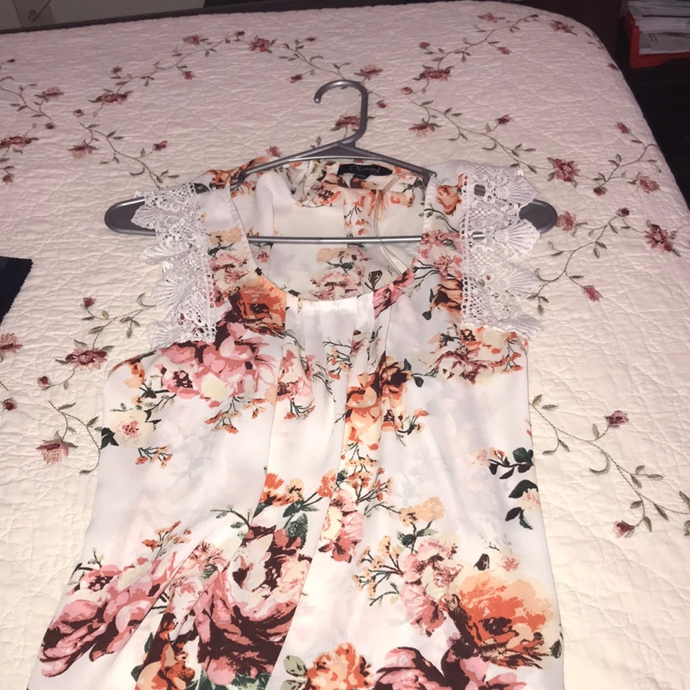 Loose blouse. Worn once. Floral design.